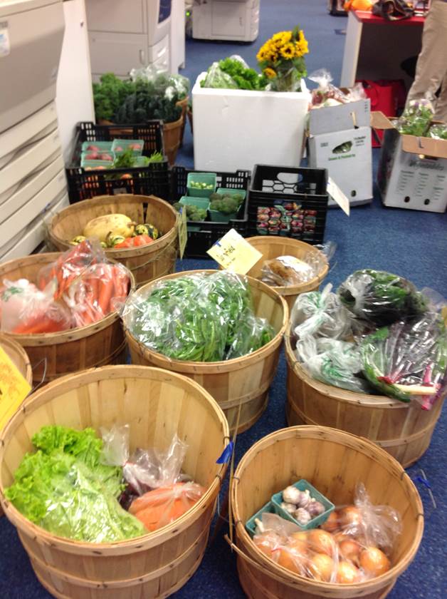 baskets of food ready for distribution near the copiers