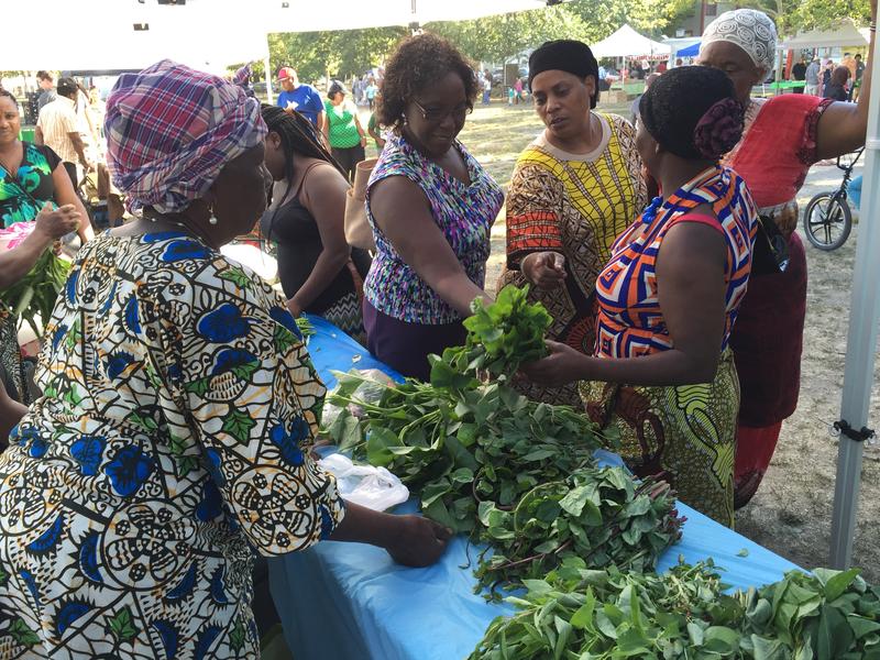 Members of AARI selling native African vegetables at a farmer’s market in Providence. Source: Rhode Island Public Radio, 2015