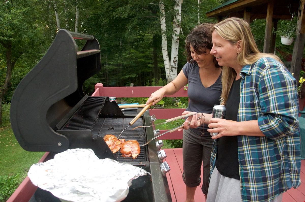 2 women grilling with VT beer