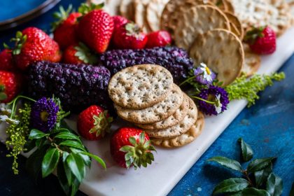 strawberries and crackers platter with flowers