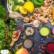 A smattering of colorful vegetables, fruit, nuts, and other food